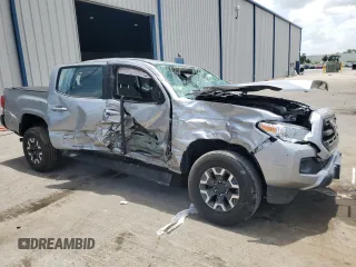 2017 Toyota Tacoma SR5 with VIN 5TFCZ5AN2HX102011, listed as a Copart auction lot 60784795 with 61,742 mi miles and Salvage title. Bid and sale history available at DreamBid. Image 4.