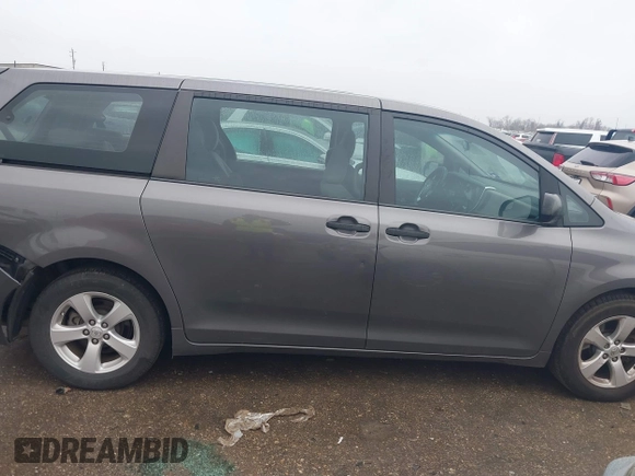 2015 Toyota Sienna L with VIN 5TDZK3DC9FS563593, listed as a IAAI auction lot 41466419 with 136,394 mi miles and . Bid and sale history available at DreamBid. Image 13.