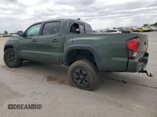 2021 Toyota Tacoma SR z VIN 3TYCZ5AN3MT046066, wystawiony jako Copart lot #54785665 z przebiegiem 57 897 mil mil oraz Szkoda całkowita • Salvage title. Historia ofert i sprzedaży dostępna na DreamBid. Obrazek 2.