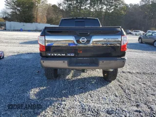 2016 Nissan Titan Platinum Reserve z VIN 1N6BA1F28GN508716, wystawiony jako Copart lot #46797225 z przebiegiem 168 572 mil mil oraz Szkoda całkowita • Salvage title. Historia ofert i sprzedaży dostępna na DreamBid. Obrazek 6.