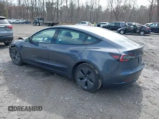 2023 Tesla Model 3 z VIN 5YJ3E1EA5PF451085, wystawiony jako IAAI lot #41941655 z przebiegiem 56 532 mil mil oraz . Historia ofert i sprzedaży dostępna na DreamBid. Obrazek 3.