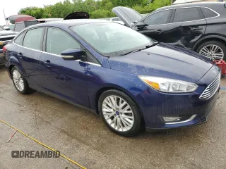 2017 Ford Focus Titanium with VIN 1FADP3J25HL291643, listed as a Copart auction lot 57657615 with 174,582 mi miles and Salvage title. Bid and sale history available at DreamBid. Image 4.
