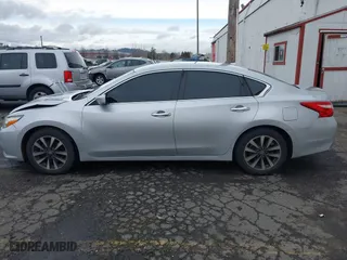 2017 Nissan Altima 2.5 SV with VIN 1N4AL3AP2HC242121, listed as a IAAI auction lot 41611846 with 145,630 mi miles. Bid and sale history available at carsss.com. Image 14.