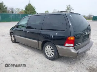 2001 Ford Windstar LTD with VIN 2FMDA58451BB03770, listed as a IAAI auction lot 42019738 with 209,452 mi miles and . Bid and sale history available at carsss.com. Image 3.