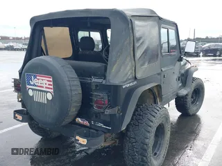 1995 Jeep Wrangler S with VIN 1J4FY19P0SP258399, listed as a IAAI auction lot 41970320 with 151,621 mi miles. Bid and sale history available at carsss.com. Image 4.