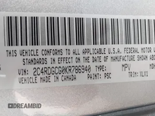 2019 Dodge Grand Caravan SXT with VIN 2C4RDGCG0KR786940, listed as a IAAI auction lot 41648332 with 96,427 mi miles and . Bid and sale history available at DreamBid. Image 9.