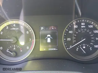 2017 Hyundai Tucson SE Plus with VIN KM8J33A40HU318652, listed as a IAAI auction lot 42092018 with 249,498 mi miles. Bid and sale history available at carsss.com. Image 7.