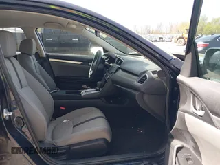2021 Honda Civic LX z VIN 19XFC2F65ME000324, wystawiony jako IAAI lot #42137375 z przebiegiem 78 473 mil mil oraz . Historia ofert i sprzedaży dostępna na DreamBid. Obrazek 5.