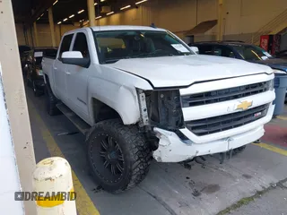 2017 Chevrolet Silverado 1500 LT with VIN 3GCUKREC4HG384231, listed as a IAAI auction lot 41414663 with 146,721 mi miles and . Bid and sale history available at DreamBid. Image 1.