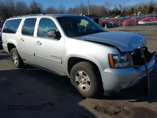 2014 Chevrolet Suburban LT with VIN 1GNSKJE75ER152008, listed as a IAAI auction lot 40938852 with 210,489 mi miles and . Bid and sale history available at DreamBid. Image 1.