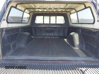 1988 Ford F-150 с VIN 1FTEF14Y1JPA75504, выставлен на аукционе IAAI как лот 42473753 с пробегом 12 730 миль миль и . История ставок и продаж доступна на DreamBid. Изображение 8.