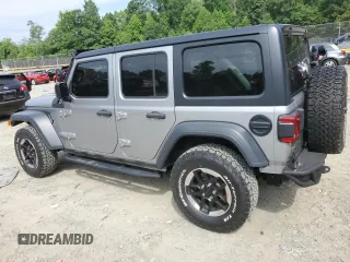 2020 Jeep Wrangler Unlimited Sport with VIN 1C4HJXDM5LW208799, listed as a Copart auction lot 61701954 with 33,873 mi miles and Salvage title. Bid and sale history available at DreamBid. Image 2.