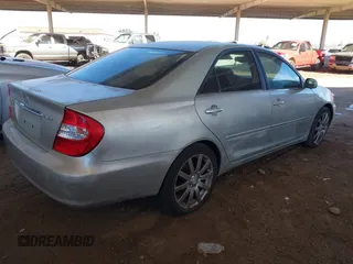 2003 Toyota Camry LE with VIN JTDBE32K730176610, listed as a IAAI auction lot 41627010 with 238,502 mi miles and . Bid and sale history available at DreamBid. Image 4.