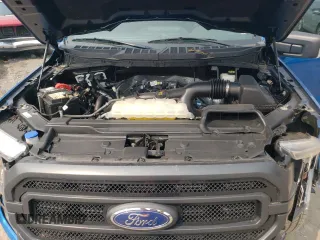 2021 Ford F-150 XL with VIN 1FTEW1EP7MFC02143, listed as a Copart auction lot 59140805 with 27,789 mi miles and Salvage title. Bid and sale history available at DreamBid. Image 11.