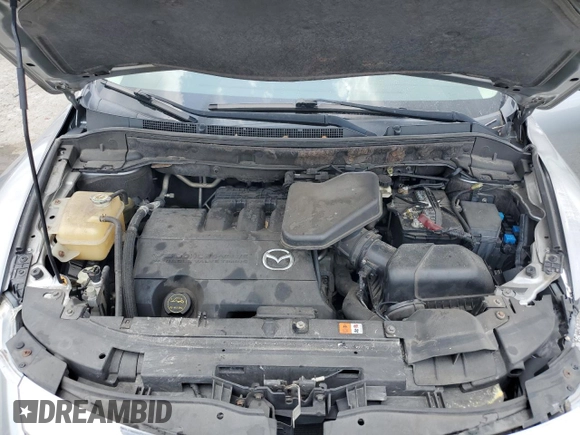 2012 Mazda CX-9 Sport with VIN JM3TB3BV4C0358070, listed as a Copart auction lot 56179335 with 206,590 mi miles and Salvage title. Bid and sale history available at DreamBid. Image 12.