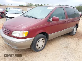 2002 Toyota Sienna LE with VIN 4T3ZF13C12U437425, listed as a IAAI auction lot 41157987 with 200,309 mi miles. Bid and sale history available at carsss.com. Image 2.