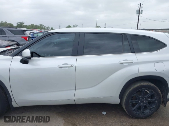 2023 Toyota Highlander L with VIN 5TDKDRAH9PS039652, listed as a IAAI auction lot 41948320 with 127,310 mi miles and . Bid and sale history available at DreamBid. Image 14.