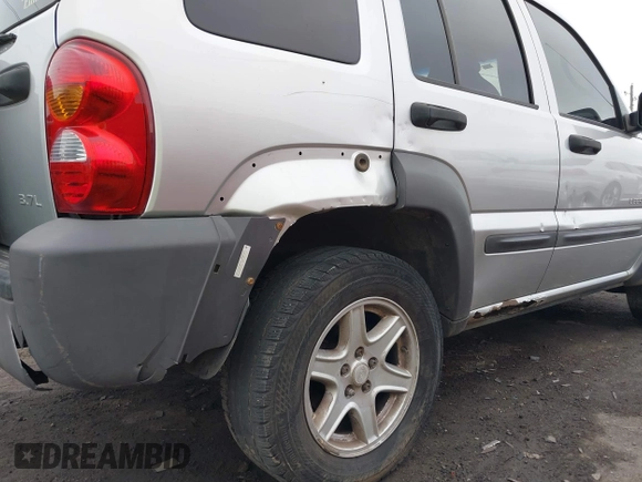 2004 Jeep Liberty Sport with VIN 1J4GL48K74W318861, listed as a IAAI auction lot 41706222 with 211,089 mi miles. Bid and sale history available at carsss.com. Image 19.