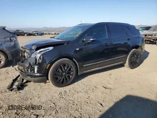 2021 Cadillac XT5 AWD Sport z VIN 1GYKNGRS5MZ116636, wystawiony jako Copart lot #73049964 z przebiegiem 30 101 mil mil oraz Szkoda całkowita • Salvage title. Historia ofert i sprzedaży dostępna na DreamBid. Obrazek 1.