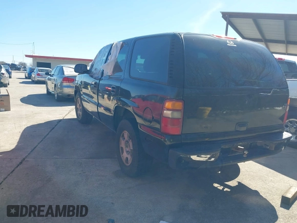 2003 GMC Yukon SLT with VIN 1GKEC13V23R135379, listed as a IAAI auction lot 41637458 with 236,134 mi miles. Bid and sale history available at carsss.com. Image 3.