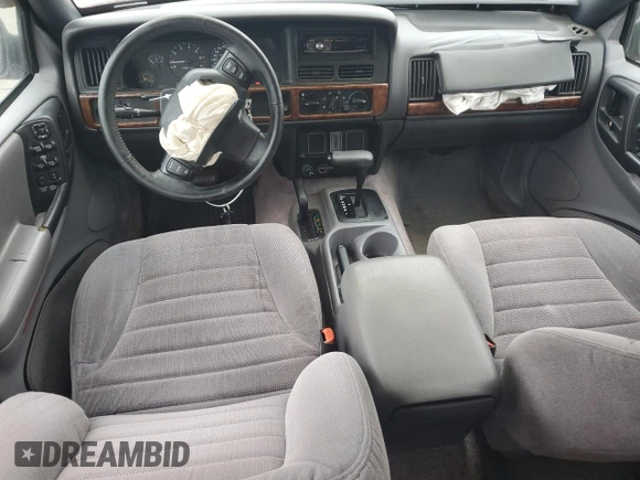 1996 Jeep Grand Cherokee Laredo with VIN 1J4GZ58S7TC292217, listed as a Copart auction lot 80757904 with 156,041 mi miles and Salvage Title. Bid and sale history available at carsss.com. Image 8.