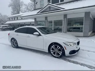 2016 BMW 4 Series 428i with VIN WBA4A9C53GG507015, listed as a IAAI auction lot 41649268 with 184,240 mi miles. Bid and sale history available at carsss.com. Image 1.