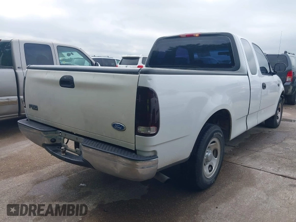 2002 Ford F-150 XL with VIN 1FTRX17202NA10047, listed as a IAAI auction lot 42122396 with 1 mi miles. Bid and sale history available at carsss.com. Image 4.