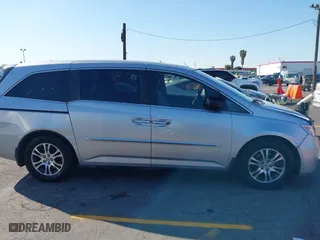2011 Honda Odyssey EX-L with VIN 5FNRL5H62BB010876, listed as a IAAI auction lot 41981812 with 195,734 mi miles. Bid and sale history available at carsss.com. Image 13.