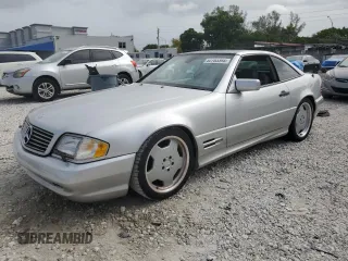 1997 Mercedes-Benz SL-Class with VIN WDBFA67F2VF151123, listed as a Copart auction lot 52703395 with 76,649 mi miles and Non Repairable. Bid and sale history available at carsss.com. Image 1.