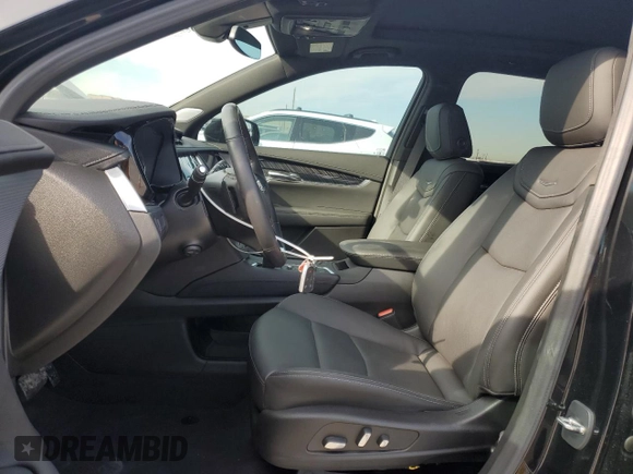 2024 Cadillac XT6 FWD Premium Luxury with VIN 1GYKPCRS7RZ710803, listed as a Copart auction lot 88152345 with 10,409 mi miles and Salvage Title. Bid and sale history available at carsss.com. Image 7.