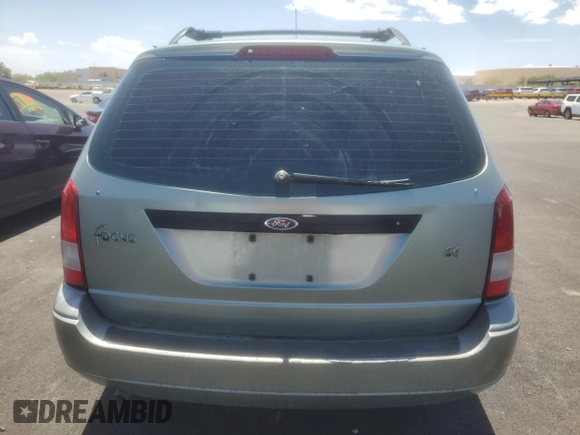 2004 Ford Focus SE with VIN 1FAFP36384W191801, listed as a Copart auction lot 63661465 with 144,226 mi miles and Salvage title. Bid and sale history available at DreamBid. Image 6.