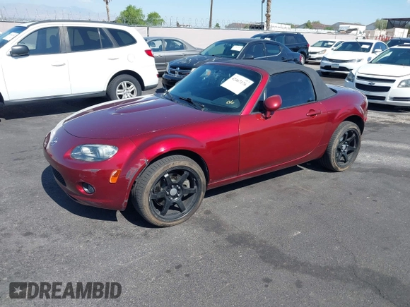 2006 Mazda MX-5 Miata Sport z VIN JM1NC25F260109008, wystawiony jako IAAI lot #42467176 z przebiegiem 139 839 mil mil oraz . Historia ofert i sprzedaży dostępna na DreamBid. Obrazek 2.