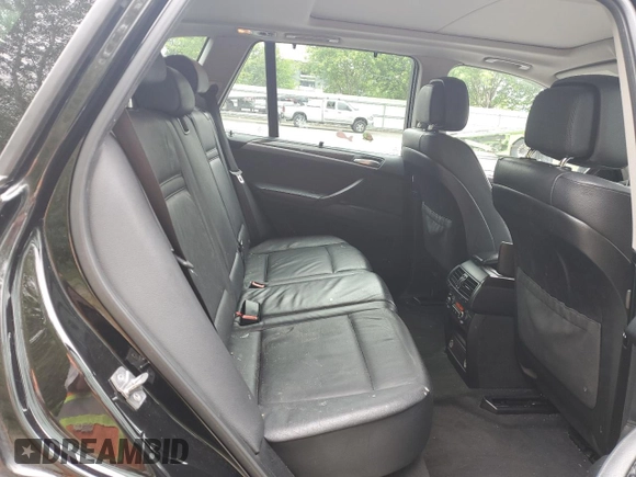 2012 BMW X5 35d with VIN 5UXZW0C54CL671377, listed as a Copart auction lot 60936395 with 105,903 mi miles and Salvage title. Bid and sale history available at DreamBid. Image 11.