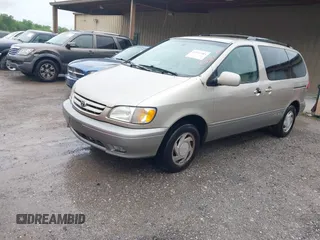 2001 Toyota Sienna LE with VIN 4T3ZF13CX1U367504, listed as a IAAI auction lot 42111583 with 302,801 mi miles and . Bid and sale history available at DreamBid. Image 2.