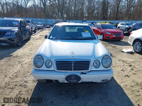 1999 Mercedes-Benz E-Class with VIN WDBJF82H0XX015778, listed as a IAAI auction lot 41269886 with 184,011 mi miles. Bid and sale history available at carsss.com. Image 12.