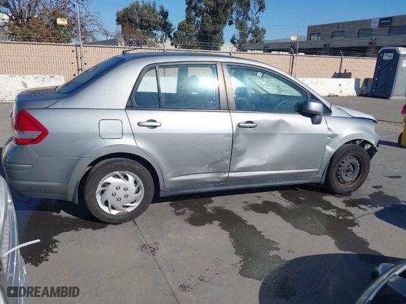 2010 Nissan Versa 1.8 S with VIN 3N1BC1AP2AL450998, listed as a IAAI auction lot 41433147 with 88,535 mi miles. Bid and sale history available at carsss.com. Image 4.