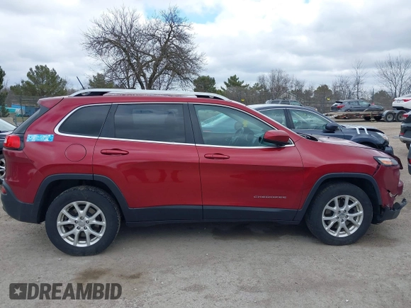 2015 Jeep Cherokee North with VIN 1C4PJMCS9FW674475, listed as a IAAI auction lot 41971771 with 186,376 mi miles. Bid and sale history available at carsss.com. Image 12.