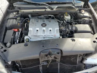 2002 Cadillac DeVille DTS with VIN 1G6KF57962U233811, listed as a Copart auction lot 80435034 with 62,005 mi miles and Salvage Title. Bid and sale history available at carsss.com. Image 11.