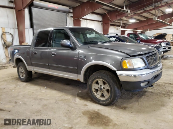 2002 Ford F-150 XLT with VIN 1FTRW08L92KD19411, listed as a Copart auction lot 50986795 with 164,556 mi miles and Clean Title. Bid and sale history available at carsss.com. Image 4.