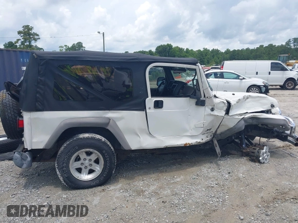 2005 Jeep Wrangler Unlimited with VIN 1J4FA44S65P368475, listed as a IAAI auction lot 42484636 with Not provided miles and . Bid and sale history available at DreamBid. Image 12.