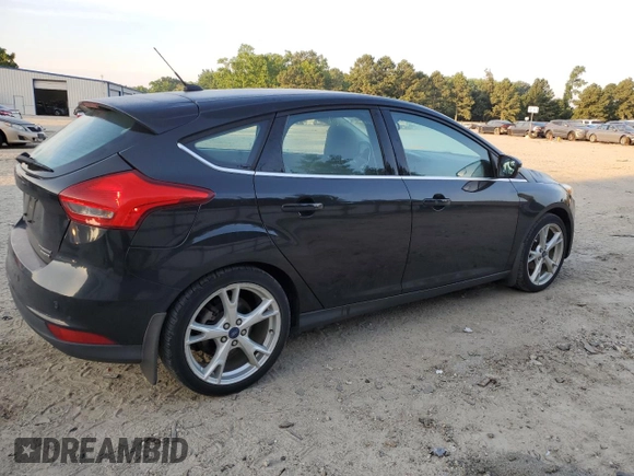 2015 Ford Focus Titanium with VIN 1FADP3N23FL346078, listed as a Copart auction lot 61991195 with 188,014 mi miles and Salvage title. Bid and sale history available at DreamBid. Image 3.