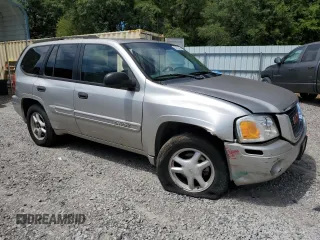 2004 GMC Envoy SLE with VIN 1GKDS13S942119615, listed as a Copart auction lot 69653494 with 141,856 mi miles and Salvage Title. Bid and sale history available at carsss.com. Image 4.