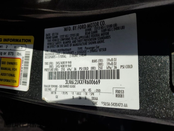 2015 Lincoln MKZ z VIN 3LN6L2JKXFR600669, wystawiony jako Copart lot #51130115 z przebiegiem 75 176 mil mil oraz Szkoda całkowita • Salvage title. Historia ofert i sprzedaży dostępna na DreamBid. Obrazek 12.