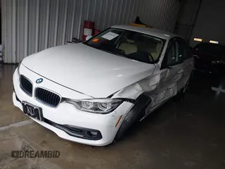 2018 BMW 3 Series 320i xDrive with VIN WBA8E5G56JNU47338, listed as a IAAI auction lot 41238204 with 54,596 mi miles. Bid and sale history available at carsss.com. Image 17.