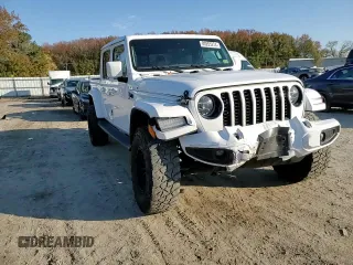 2021 Jeep Gladiator High Altitude с VIN 1C6HJTFG8ML608303, выставлен на аукционе Copart как лот 80255274 с пробегом 56 191 миль миль и Списание • Salvage title. История ставок и продаж доступна на DreamBid. Изображение 11.