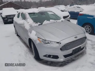 2015 Ford Fusion Energi Titanium with VIN 3FA6P0SU8FR300096, listed as a IAAI auction lot 41545148 with 70,060 mi miles. Bid and sale history available at carsss.com. Image 1.