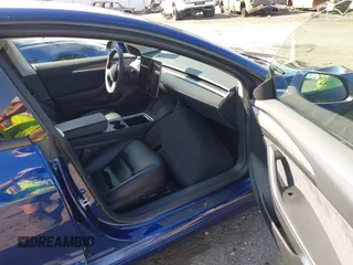 2023 Tesla Model 3 Long Range with VIN 5YJ3E1EB0PF620745, listed as a IAAI auction lot 42010603 with 39,846 mi miles and . Bid and sale history available at DreamBid. Image 5.