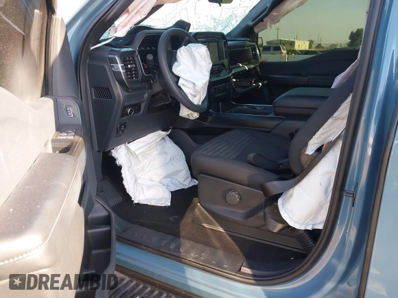 2023 Ford F-150 XL with VIN 1FTEW1EP4PKF58559, listed as a IAAI auction lot 40953057 with 7,900 mi miles. Bid and sale history available at carsss.com. Image 5.