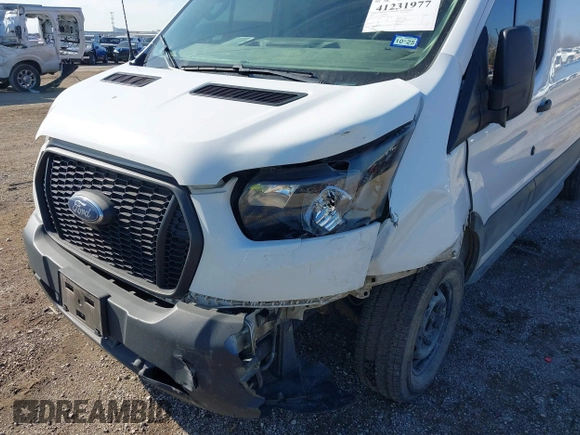 2022 Ford Transit Cargo with VIN 1FTYE1YG3NKA77243, listed as a IAAI auction lot 41231977 with 55,300 mi miles and . Bid and sale history available at DreamBid. Image 6.