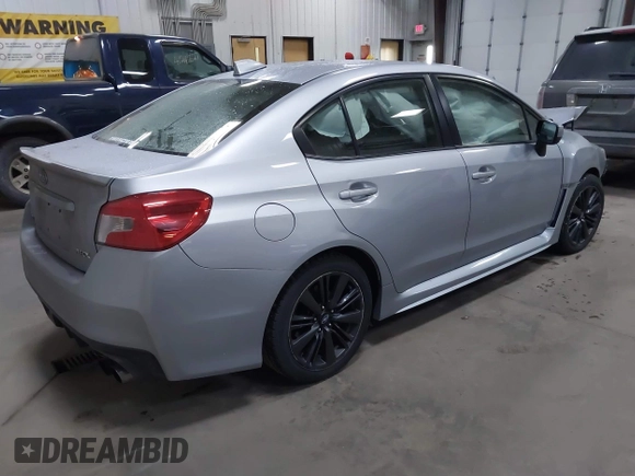 2015 Subaru WRX Premium with VIN JF1VA1D66F8830943, listed as a IAAI auction lot 41282679 with 149,236 mi miles. Bid and sale history available at carsss.com. Image 4.